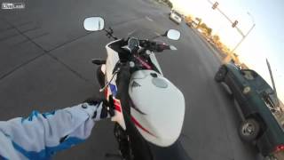 Good Hearted Motorcycle Rider Saves Kitten in Traffic