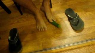 Male feet and cucumber