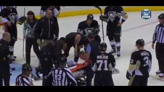Pascal Dupuis takes a shot to the head, would be taken off on a stretcher