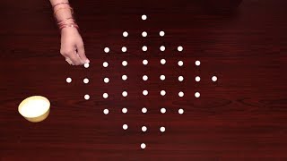 Simple Rangoli with 9X1 dots in Telugu lo Muggulu | Kolam latest designs