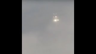 Strange UFO Lights Shimmer Next to Airplane [SIGHTING]