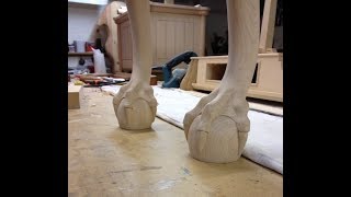 Maple cabriole leg with a dragon's foot clasping a ball.