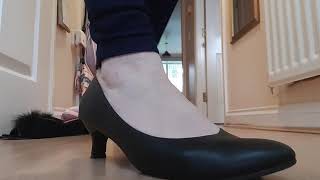 crushing black leather heels with my velvet slippers