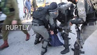 Israeli forces clash with protesters at march against alleged assaults by settlers