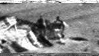 Two Figures Check Out Crashed UFO On Mars