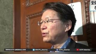 Japan pushes security bills through lower house, despite protests