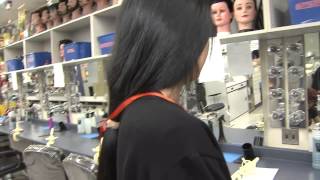 Teen's ankle-length hair cut for cancer