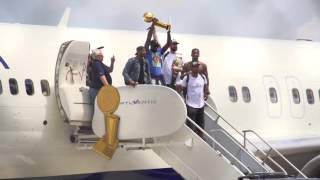 Cavs fans greet the Cleveland Cavaliers as they arrive back home