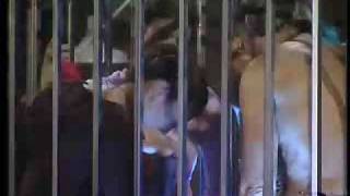 Jun's Turn to Pee in a metal Cage Big Brother 4 Live Feed
