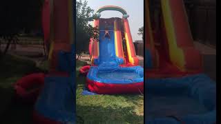 Adult Hits Himself Using Kid's Inflatable Slide - 1003715