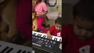 Playing the piano, 2018, Manha Muskaan Mahmood (personal/home video) 1789