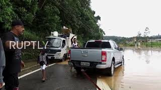 Brazil: Stuck driver gets help on Caieiras road as deadly floods hit Sao Paulo