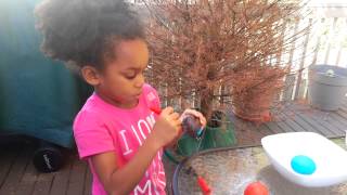 Tami painting easter eggs