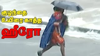 Viral video | Man saves child from Kerala Flood