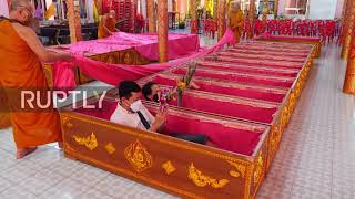 Thailand: Buddhist devotees take part in resurrection ritual in Bangkok