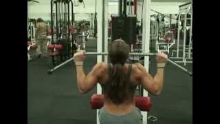 Strong Muscle Woman back workout in gym