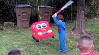 Mateo hits the Rayo McQueen Pinata