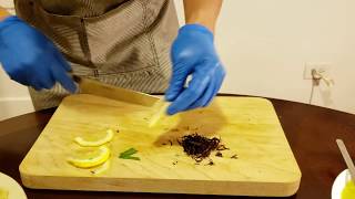 How a Sushi Chef makes Yellowtail Hamachi sashimi with Lemon and Ponzu sauce.