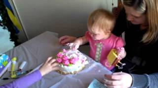 Baby's first birthday, so funny dives into cake.......