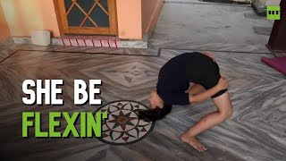 NOT REVERSED: Young Indian gymnast shows off amazing flexibility