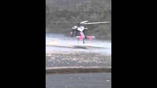 Helicopters fighting San Diego fires collect water at Discovery Lake 1