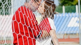 Young Guy And Beautiful Girl Kissing On The Football Field | Stock Footage - Videohive