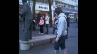LIVING STATUE GETS PANTS PULLED DOWN INFRONT OF CROWD