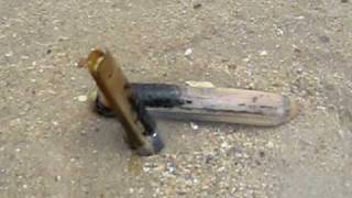 couteau (coquillage) re-rentre dans le sable
