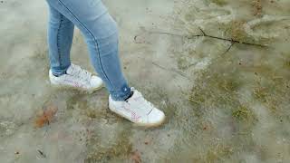 Girl walking in slush with white Vans! How long before they get wet XD