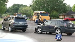 Accident sends vehicles into school bus filled with kids
