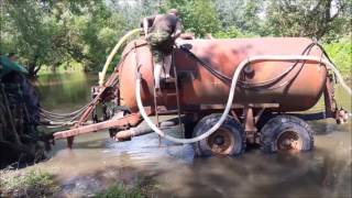 Битва за урожай 2016, испытание бочки  МЖТ-6 трактром John Deere 8200 на реке красная (раминте)