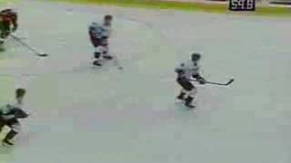 Lindros hits Kozlov