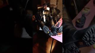 Smoking in leather and boots
