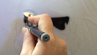 Airbrushing a storm trooper on a T-shirt
