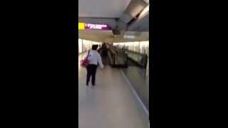 Walking to Passport Control at Heathrow