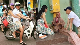 Vợ chồng Công Vinh - Thủy Tiên chạy xe máy, mang dép lê về quê làm từ thiện - TIN TỨC 24H TV