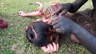 Primitive Life - An ethnic girl seeking wild bamboo by chance meets a forest person