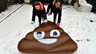 Kids Playing In The Snow On Giant Emoji Floaties | Toys AndMe