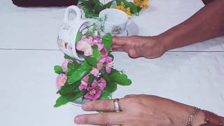 Cascata de flores na xícara