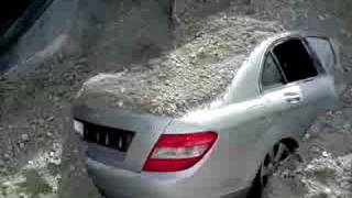 Lorry crash traps Mercedes driver