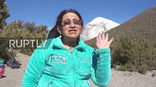 'Cholitas' climbers ascend Bolivia's highest mountain to send women's empowerment message