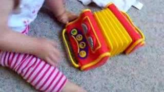 Chelsea plays Wiggles Accordian (Accordion) and Turtle Squeezebox