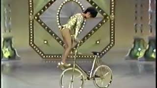 Japanese Ballerina in heels does freestyle BMX tricks 53 years ago