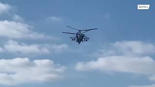 Russian army helicopter destroys Ukrainian military equipment