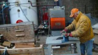 Old man Cane sawing wood