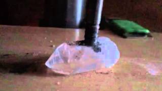 Piezoluminescence in a quartz crystal