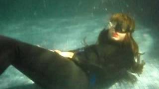 latex clad underwater