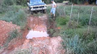 1975 Ford F100 Truck Playing in the Mud Hole