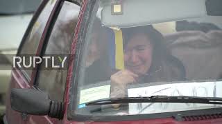 Ukraine/Romania: Ukrainians can't hold back tears leaving homeland