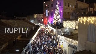 East Jerusalem: Hundreds gather to witness Xmas tree lighting and fireworks